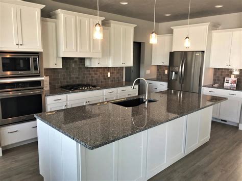 steel gray granite with white cabinets|granite countertops white cabinets.